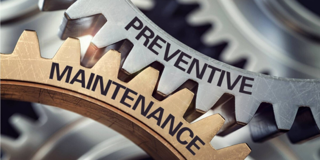 Deux roues qui s'imbriquent avec la mention maintenance préventive
